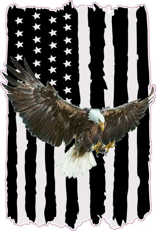 Worn black American flag with soaring bald eagle decal.